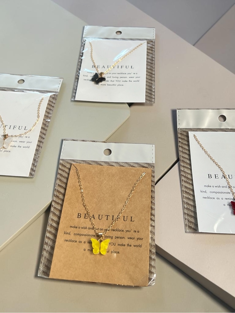 Set of 4 pendant butterfly necklaces